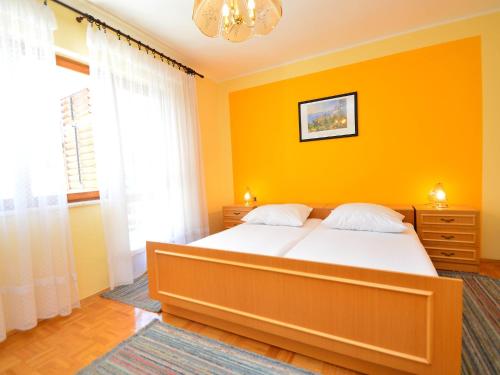 Postel nebo postele na pokoji v ubytování Apartment Milenko-3 by Interhome
