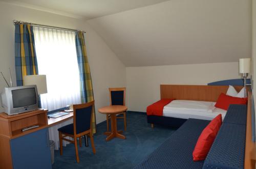 Katil atau katil-katil dalam bilik di Landhotel Sulzbacher Hof