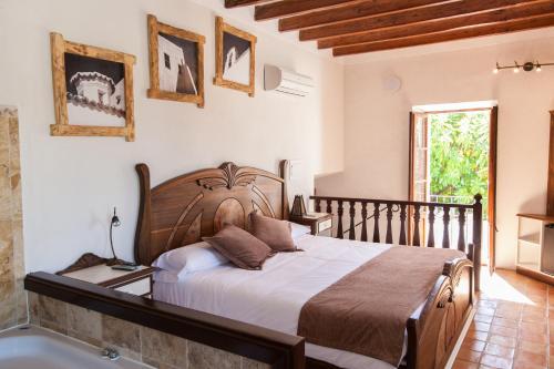 Katil atau katil-katil dalam bilik di Agroturismo Can Pere Sord