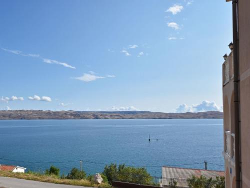 a view of a large body of water from a building at Apartment Delfin-4 by Interhome in Cesarica