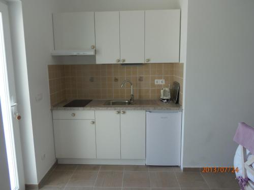 Dapur atau dapur kecil di Apartments Palma