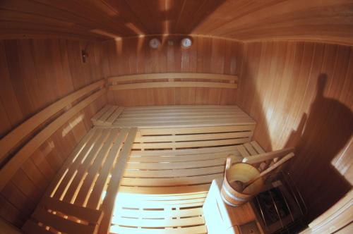 an inside of a sauna with a bench in it at Köcks Bed & Breakfast in Galtür