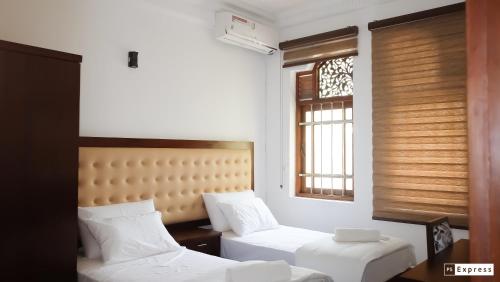 Katil atau katil-katil dalam bilik di Vivid Colombo