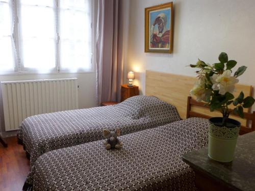 En eller flere senge i et værelse på Apartment Merbonne-2 by Interhome