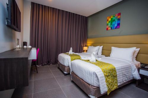 Ένα ή περισσότερα κρεβάτια σε δωμάτιο στο Hotel Costa Brava