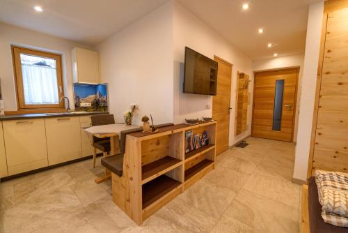 Kuchyň nebo kuchyňský kout v ubytování Chalet Schwarzenstein