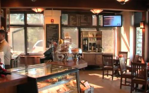 a restaurant with a bakery with a counter and chairs at Asilomar Conference Grounds in Pacific Grove