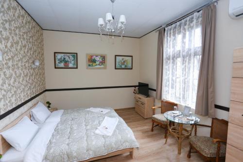 Ένα ή περισσότερα κρεβάτια σε δωμάτιο στο Guest House Marrakech