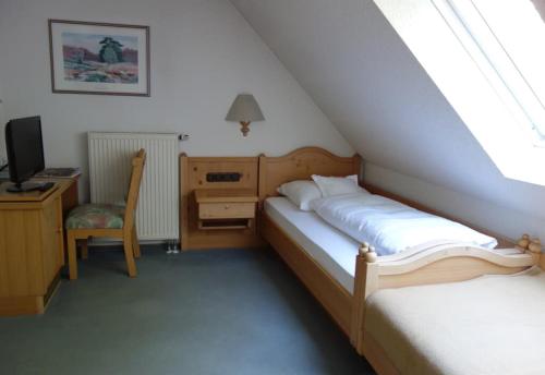 Postel nebo postele na pokoji v ubytování Hotel Bayerischer Hof