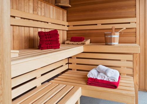 a sauna with two sausages and towels in it at Kackar Resort Hotel in Ayder Yaylasi