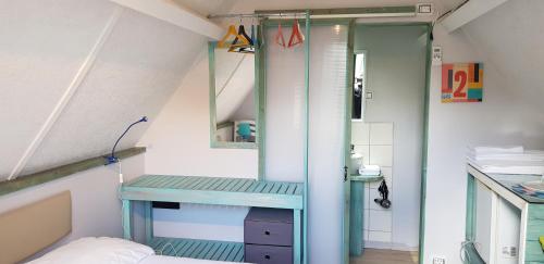 a room with a dressing table and a mirror at Sunseabeach in Marzamemi