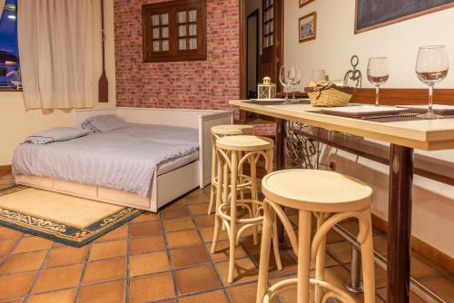 Ένα ή περισσότερα κρεβάτια σε δωμάτιο στο A Escalinata Apartamento-Loft