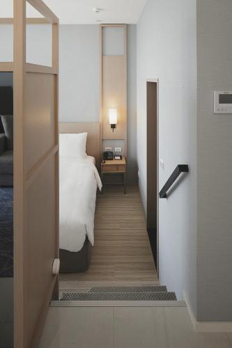 Cama o camas de una habitación en Jolley Hotel