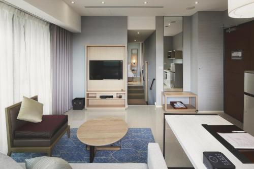 TV a/nebo společenská místnost v ubytování Jolley Hotel