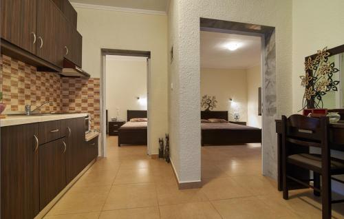 Кровать или кровати в номере Sunset Studios - Suites with Seaview & Back Side Apartements