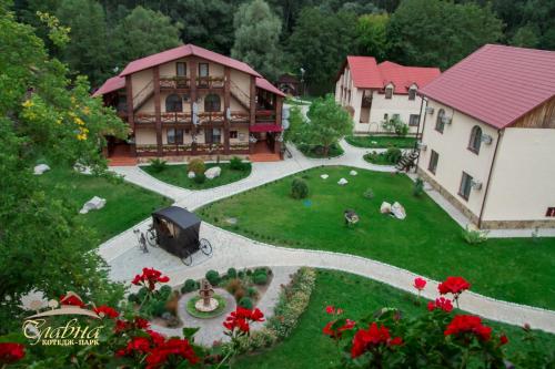 an aerial view of a house with a garden at Котедж-парк Славна in Okhtyrka