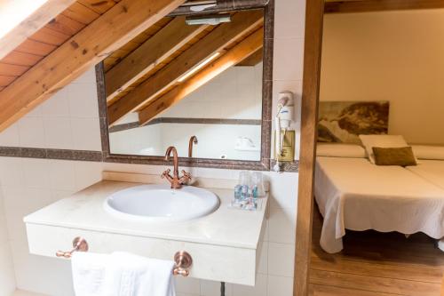 Postel nebo postele na pokoji v ubytování Hotel Ambasmestas