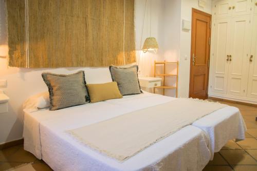 Una cama o camas en una habitación de Hotel Mariantonia