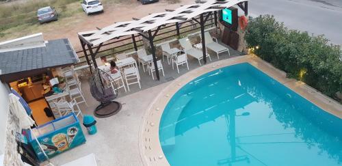 Gambar di galeri bagi Hatzoudis Luxury Suites di Chrysi Ammoudia