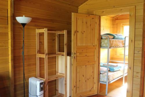 Ένα ή περισσότερα κρεβάτια σε δωμάτιο στο Camping Fragadeume