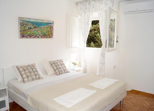 Posteľ alebo postele v izbe v ubytovaní Apartment Two air - con