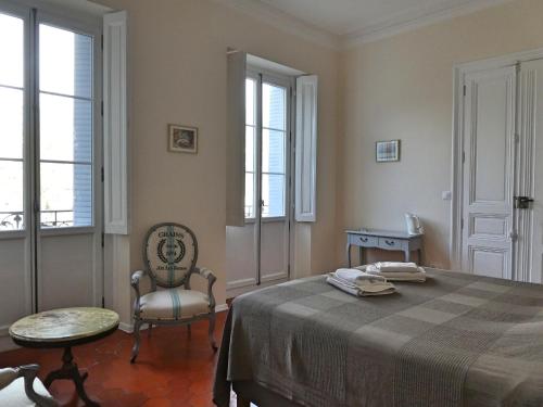 Postel nebo postele na pokoji v ubytování Chambre d'hôtes Eloi Merle