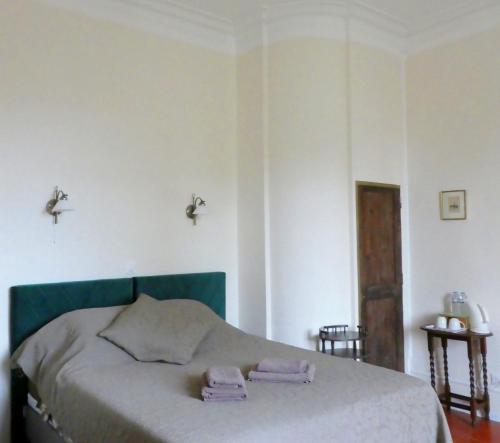 Postel nebo postele na pokoji v ubytování Chambre d'hôtes Eloi Merle