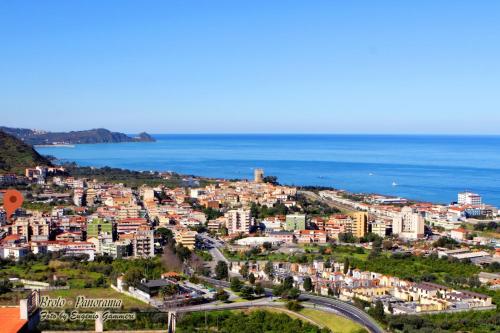 an aerial view of a city and the ocean at Al Castello in Brolo