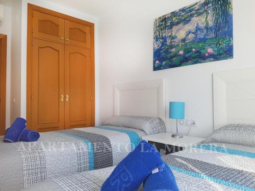 Posteľ alebo postele v izbe v ubytovaní Apartamento La Morera