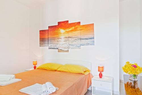 Ліжко або ліжка в номері Focallo Seaside Holiday Flat