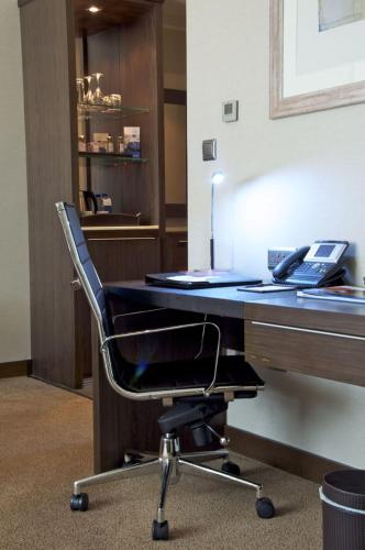  Ramada Downtown Abu Dhabi -  Room  picture :   Tea/Coffee maker    Minibar    Shower                           