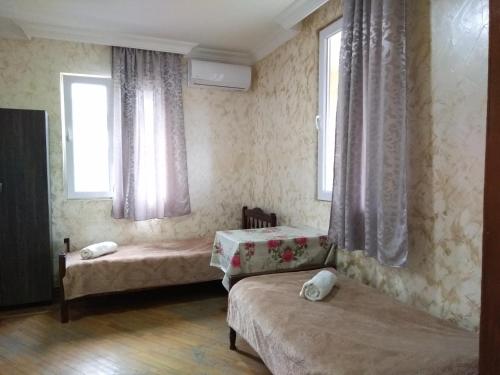 Кровать или кровати в номере Guest House Nika & Nina