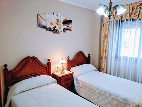Ένα ή περισσότερα κρεβάτια σε δωμάτιο στο Lima-Galibel