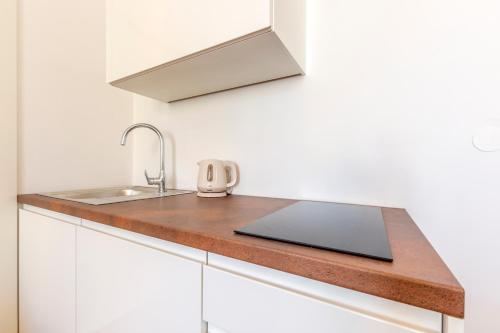 A kitchen or kitchenette at I love Split Apartments