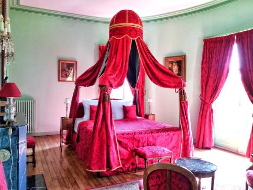Ένα ή περισσότερα κρεβάτια σε δωμάτιο στο Château de Chantore