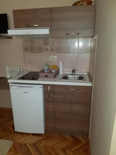 Apartments Antにあるキッチンまたは簡易キッチン