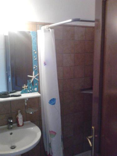 Bilik mandi di studio στην θαλασσα