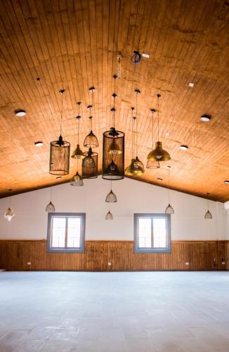 an empty dance floor in a large room with lights at NOI Blend Colchagua in Santa Cruz