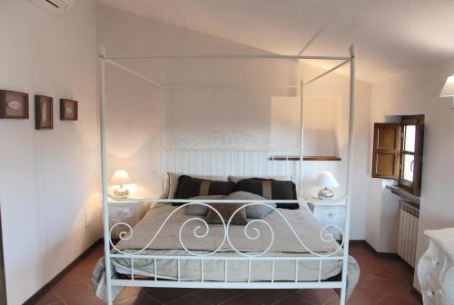 Posteľ alebo postele v izbe v ubytovaní Il Riccio-casale panoramico con piscina in Versilia