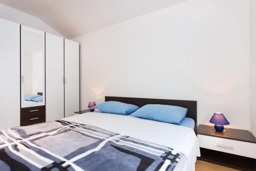 Krevet ili kreveti u jedinici u okviru objekta Adria Punat Apartments
