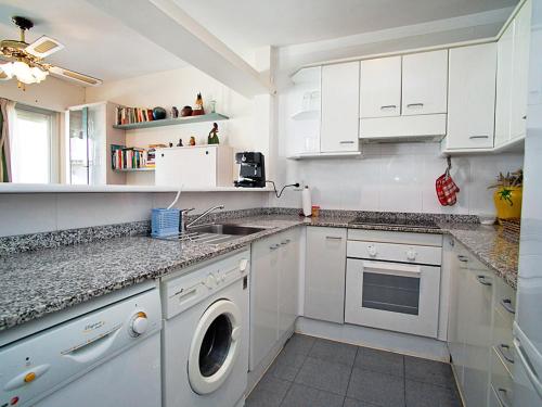 A kitchen or kitchenette at Apartment DMS IV-1 by Interhome