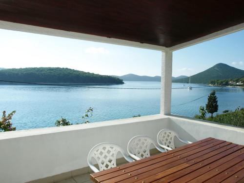 a balcony with a view of the water at Apartment Agneza by Interhome in Brgulje