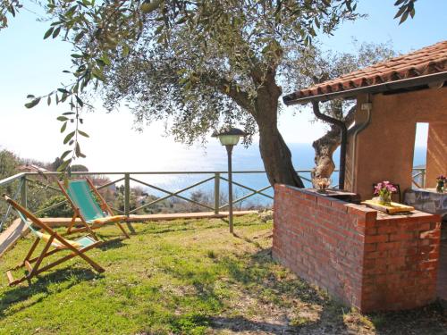 a house with a view of the ocean at Holiday Home Villa Sara by Interhome in Finale Ligure