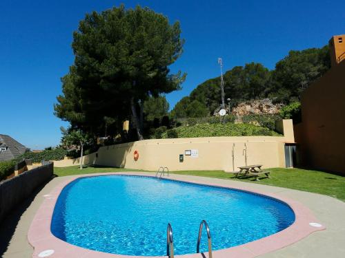 The swimming pool at or close to Holiday Home Vistamar by Interhome