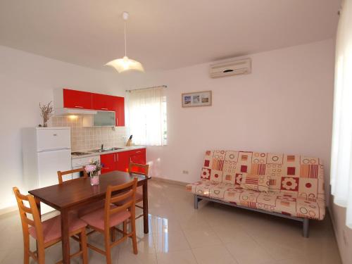 Kuchyň nebo kuchyňský kout v ubytování Apartment Maslina-1 by Interhome