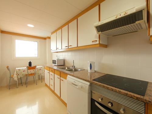 A kitchen or kitchenette at Apartment Blanes Playa by Interhome