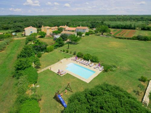 an aerial view of an estate with a swimming pool at Villa Stancija Negrin by Interhome in Krnjaloža