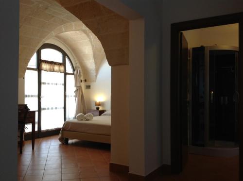Postel nebo postele na pokoji v ubytování Masseria La Porticella