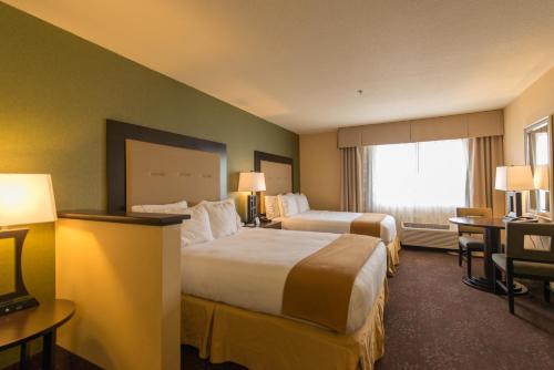 a hotel room with two beds and a window at Holiday Inn Express Portland East - Columbia Gorge, an IHG Hotel in Troutdale