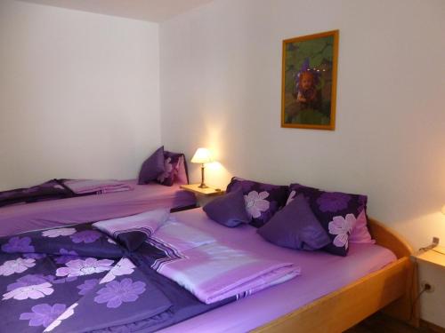 Ένα ή περισσότερα κρεβάτια σε δωμάτιο στο Haus Tyrol